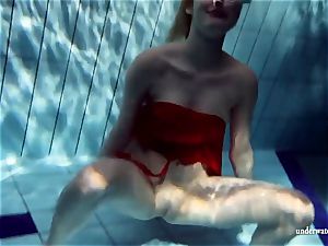 steaming platinum-blonde Lucie French nubile in the pool