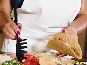 buxom Latina instructs JMac how to fill taco shells